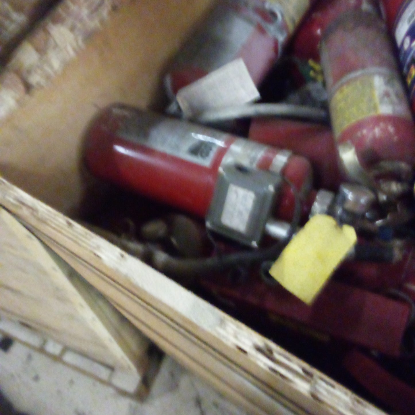 M00261 - Box of used fire extinguishers